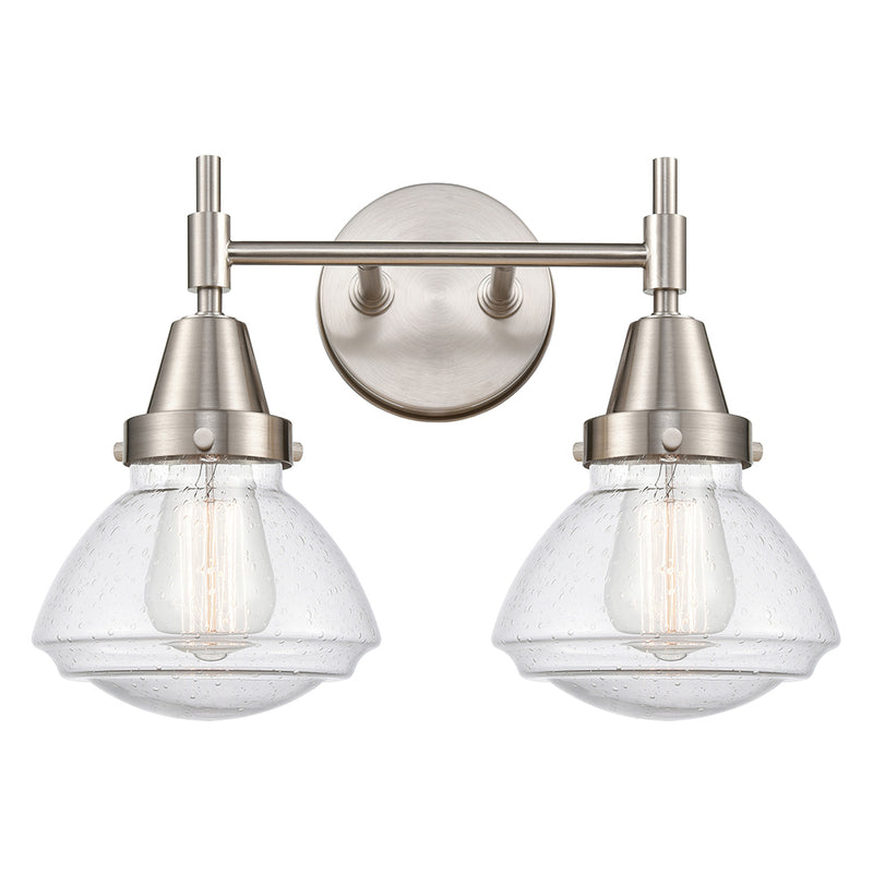 Caden Bath Vanity Light shown in the Satin Nickel finish with a Seedy shade