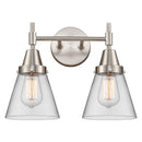 Caden Bath Vanity Light shown in the Satin Nickel finish with a Clear shade