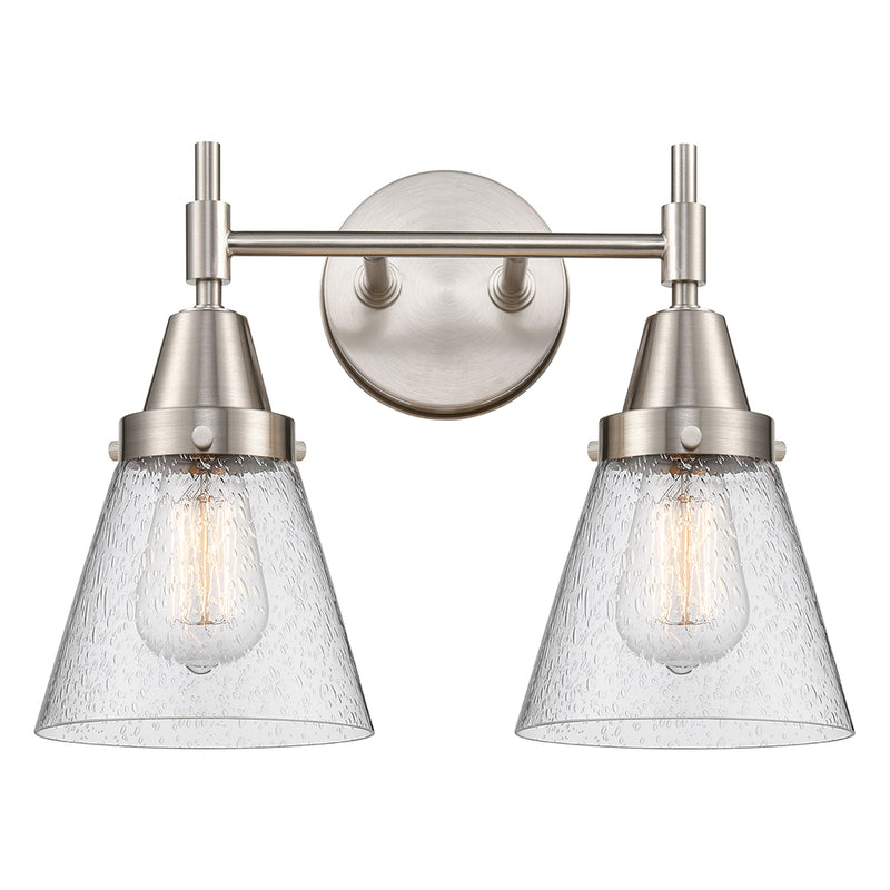 Caden Bath Vanity Light shown in the Satin Nickel finish with a Seedy shade