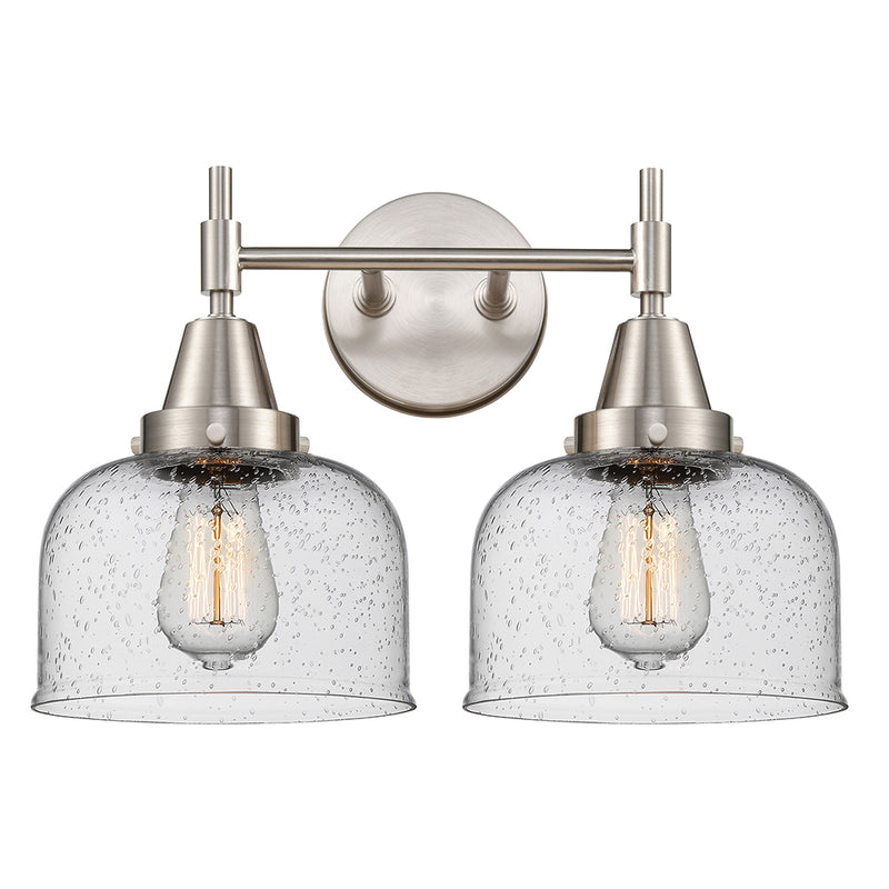 Caden Bath Vanity Light shown in the Satin Nickel finish with a Seedy shade