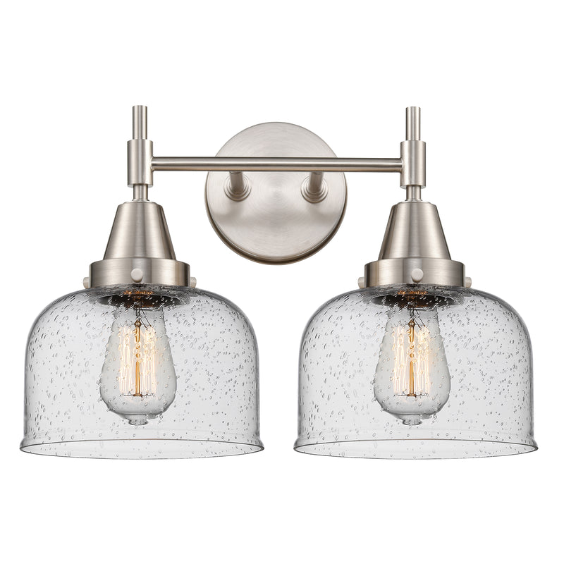 Caden Bath Vanity Light shown in the Satin Nickel finish with a Seedy shade