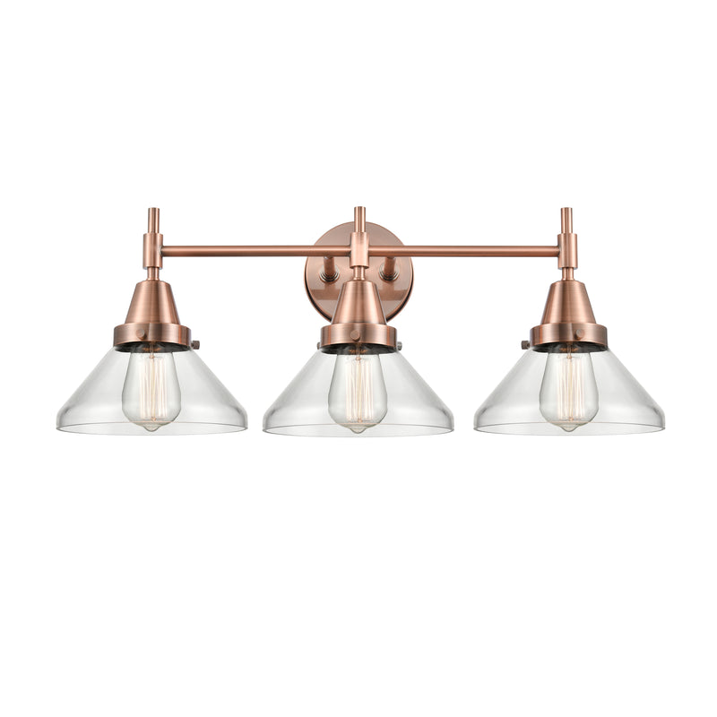 Caden Bath Vanity Light shown in the Antique Copper finish with a Clear shade