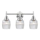 Caden Bath Vanity Light shown in the Polished Chrome finish with a Clear Halophane shade