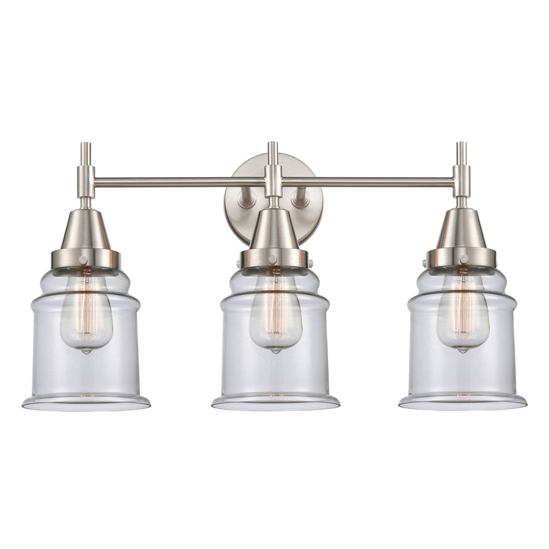 Caden Bath Vanity Light shown in the Satin Nickel finish with a Clear shade