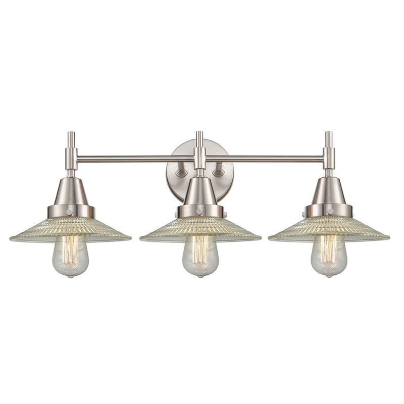 Caden Bath Vanity Light shown in the Satin Nickel finish with a Clear Halophane shade