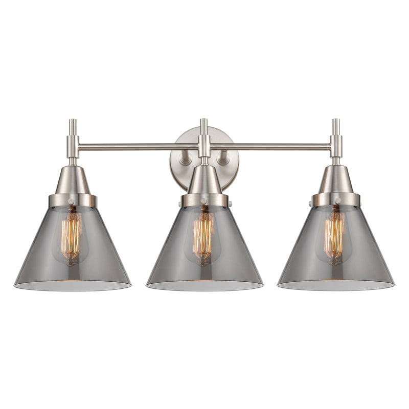 Caden Bath Vanity Light shown in the Satin Nickel finish with a Plated Smoke shade