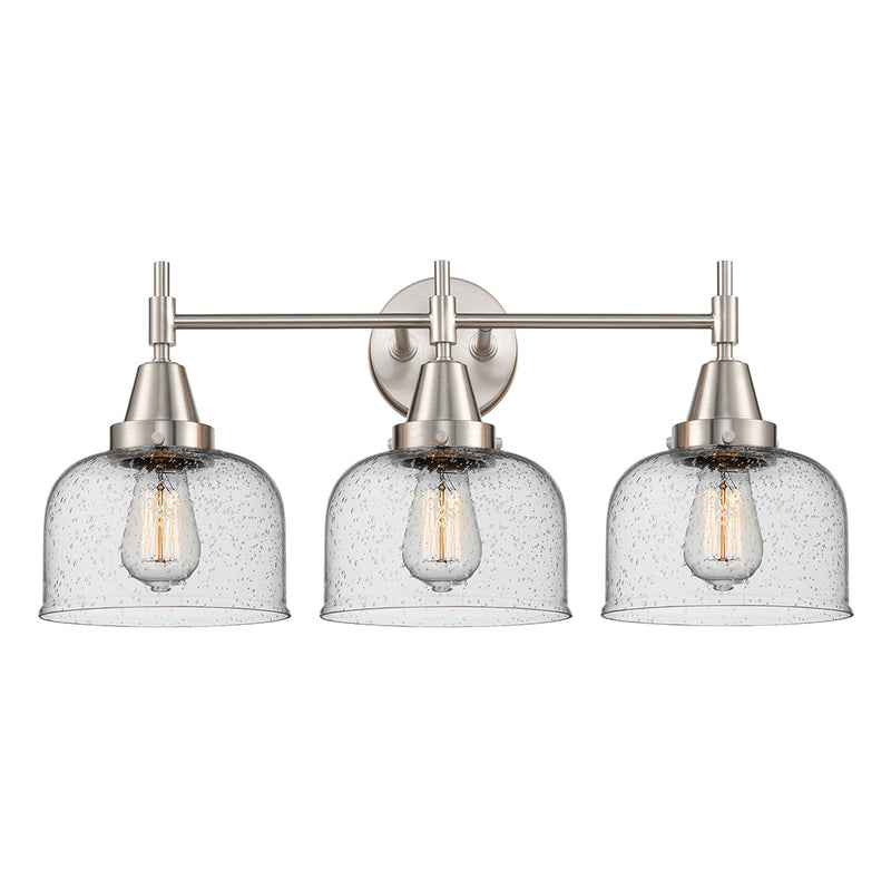 Caden Bath Vanity Light shown in the Satin Nickel finish with a Seedy shade