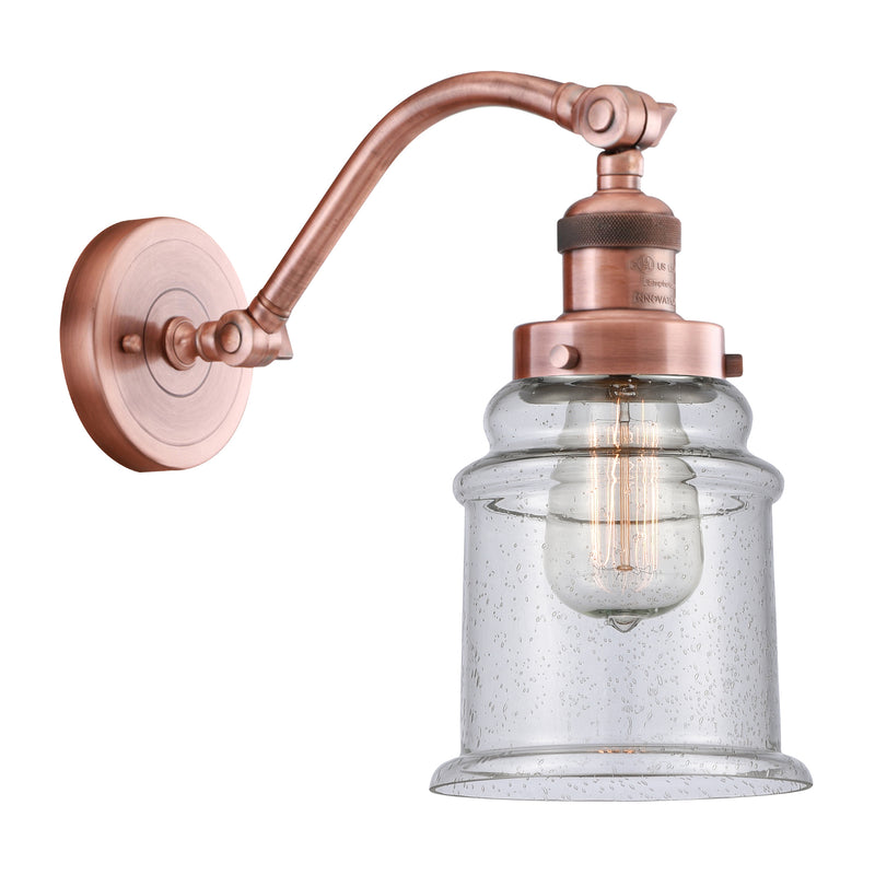 Canton Sconce shown in the Antique Copper finish with a Seedy shade