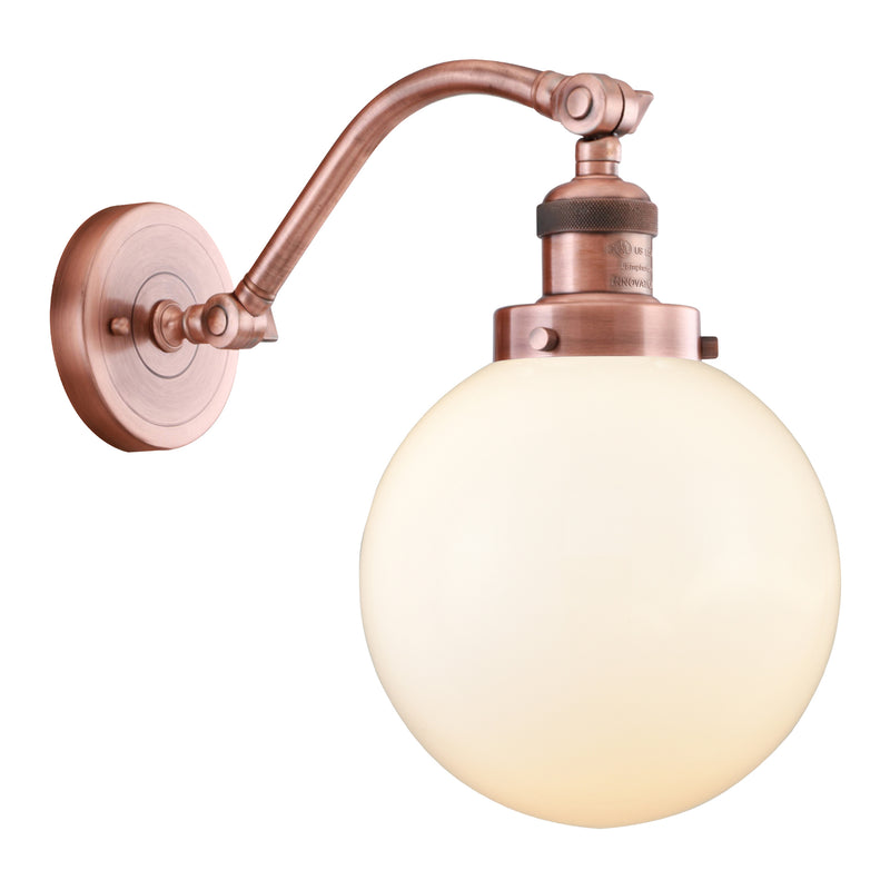 Beacon Sconce shown in the Antique Copper finish with a Matte White shade