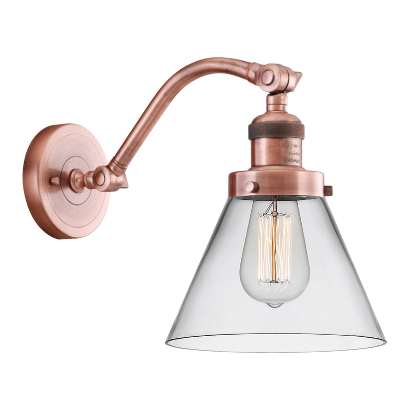 Cone Sconce shown in the Antique Copper finish with a Clear shade