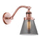 Cone Sconce shown in the Antique Copper finish with a Plated Smoke shade