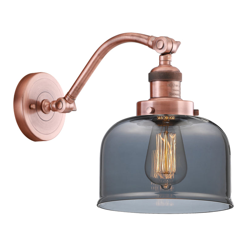 Bell Sconce shown in the Antique Copper finish with a Plated Smoke shade