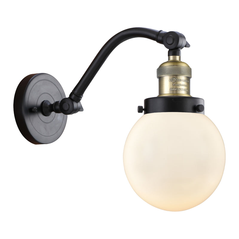 Beacon Sconce shown in the Black Antique Brass finish with a Matte White shade