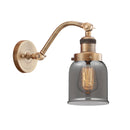 Bell Sconce shown in the Brushed Brass finish with a Plated Smoke shade