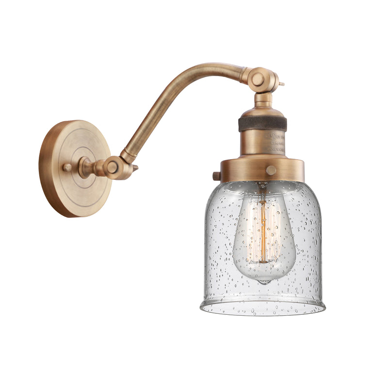 Bell Sconce shown in the Brushed Brass finish with a Seedy shade