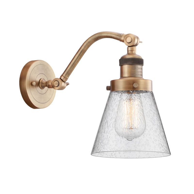 Cone Sconce shown in the Brushed Brass finish with a Seedy shade