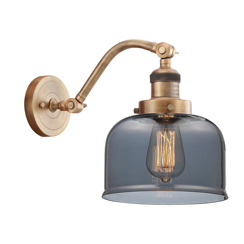 Bell Sconce shown in the Brushed Brass finish with a Plated Smoke shade