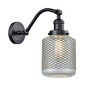 Stanton Sconce shown in the Matte Black finish with a Clear Wire Mesh shade