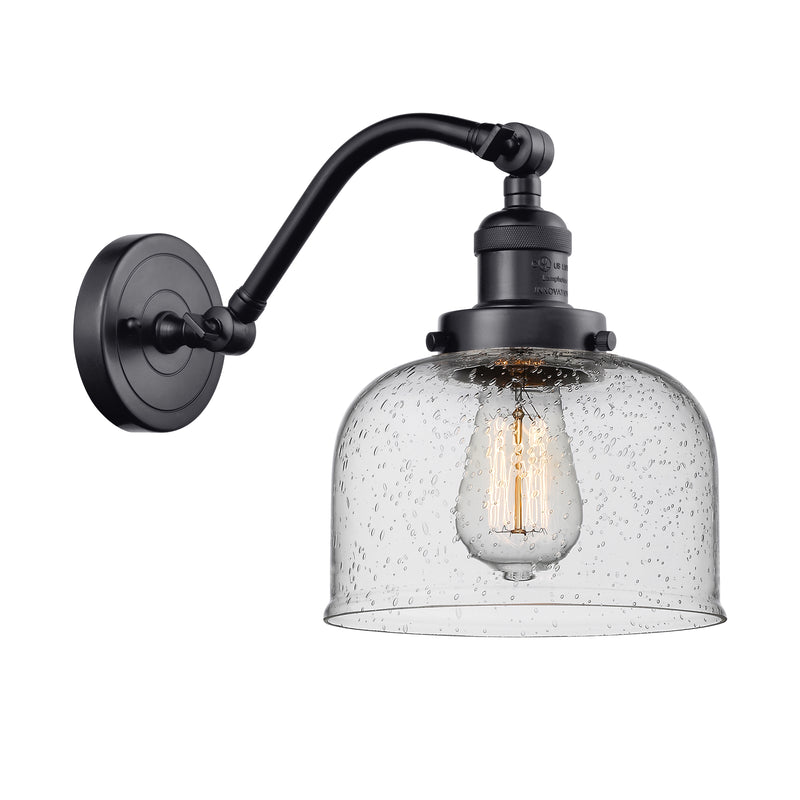 Bell Sconce shown in the Matte Black finish with a Seedy shade