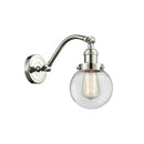 Beacon Sconce shown in the Polished Nickel finish with a Clear shade