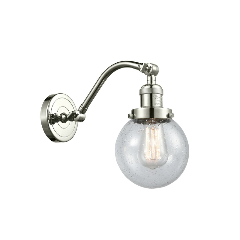 Beacon Sconce shown in the Polished Nickel finish with a Seedy shade