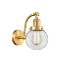 Beacon Sconce shown in the Satin Gold finish with a Clear shade