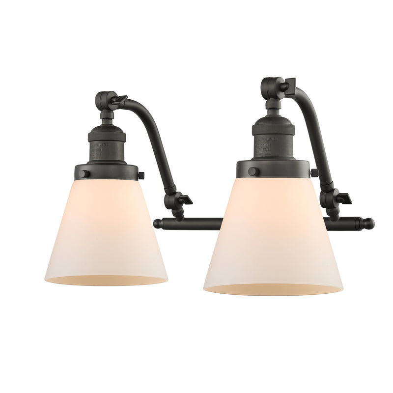 Cone Bath Vanity Light shown in the Oil Rubbed Bronze finish with a Matte White shade