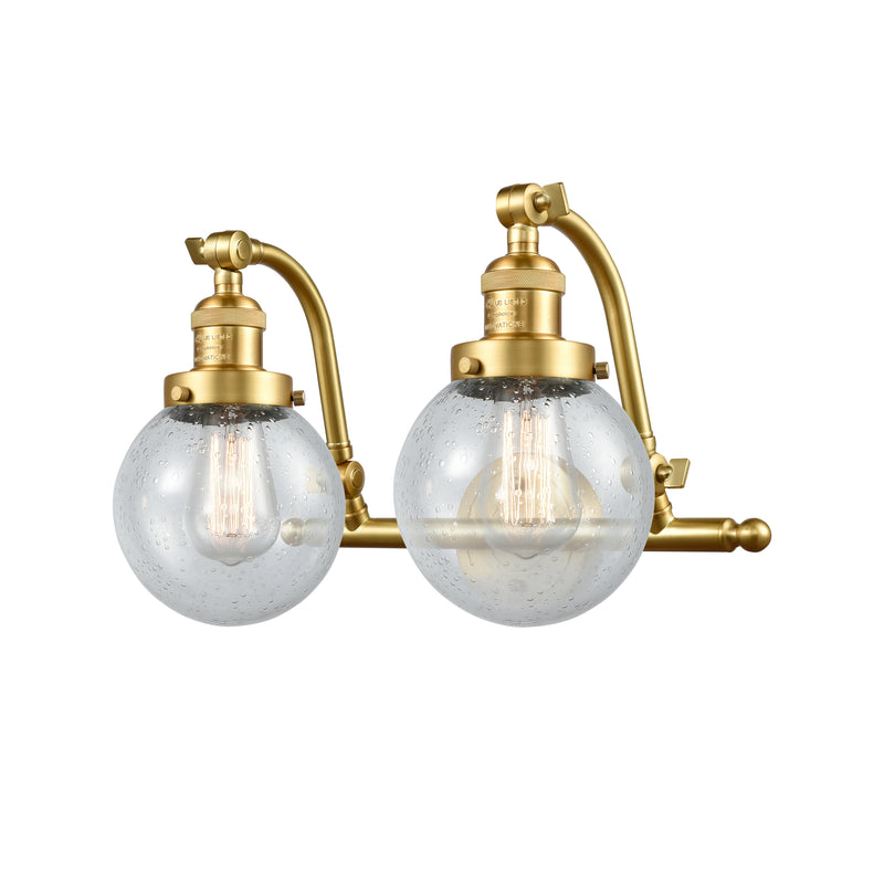 Beacon Bath Vanity Light shown in the Satin Gold finish with a Seedy shade