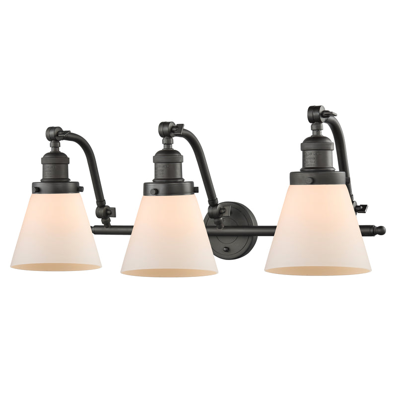 Cone Bath Vanity Light shown in the Oil Rubbed Bronze finish with a Matte White shade