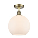 Athens Semi-Flush Mount shown in the Antique Brass finish with a Matte White shade