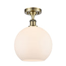 Athens Semi-Flush Mount shown in the Antique Brass finish with a Matte White shade