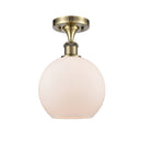 Athens Semi-Flush Mount shown in the Antique Brass finish with a Matte White shade