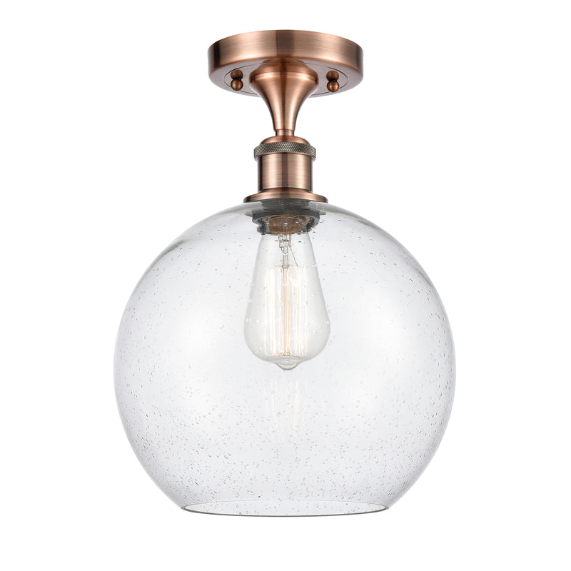 Athens Semi-Flush Mount shown in the Antique Copper finish with a Seedy shade