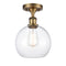 Athens Semi-Flush Mount shown in the Brushed Brass finish with a Clear shade