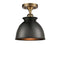 Adirondack Semi-Flush Mount shown in the Brushed Brass finish with a Matte Black shade