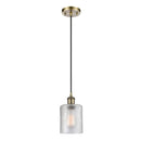 Cobbleskill Mini Pendant shown in the Antique Brass finish with a Clear shade