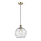 Deco Swirl Mini Pendant shown in the Antique Brass finish with a Clear shade