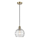 Deco Swirl Mini Pendant shown in the Antique Brass finish with a Clear shade