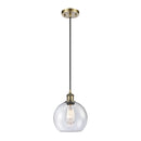 Athens Mini Pendant shown in the Antique Brass finish with a Seedy shade