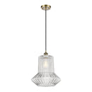 Springwater Mini Pendant shown in the Antique Brass finish with a Clear Spiral Fluted shade