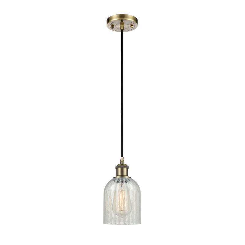 Caledonia Mini Pendant shown in the Antique Brass finish with a Mouchette shade