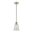 Hanover Mini Pendant shown in the Antique Brass finish with a Mouchette shade