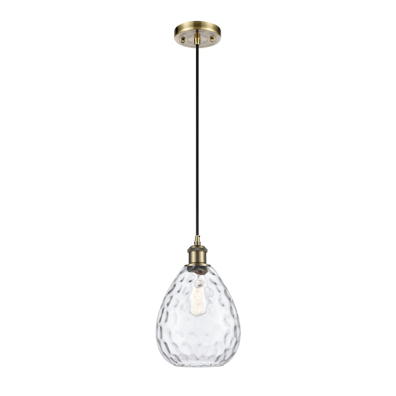 Waverly Mini Pendant shown in the Antique Brass finish with a Clear shade