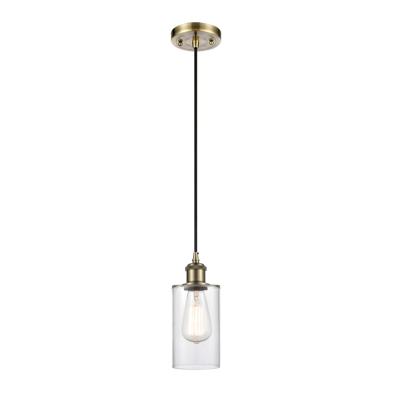 Clymer Mini Pendant shown in the Antique Brass finish with a Clear shade