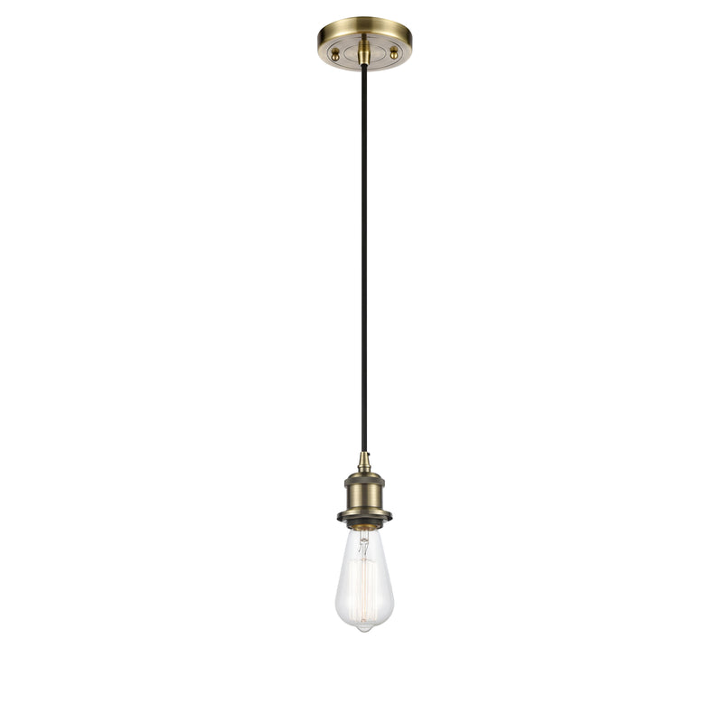 Bare Bulb Mini Pendant shown in the Antique Brass finish