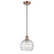 Deco Swirl Mini Pendant shown in the Antique Copper finish with a Clear shade