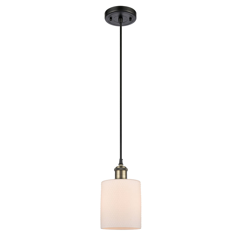 Cobbleskill Mini Pendant shown in the Black Antique Brass finish with a Matte White shade