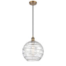 Deco Swirl Mini Pendant shown in the Brushed Brass finish with a Clear shade