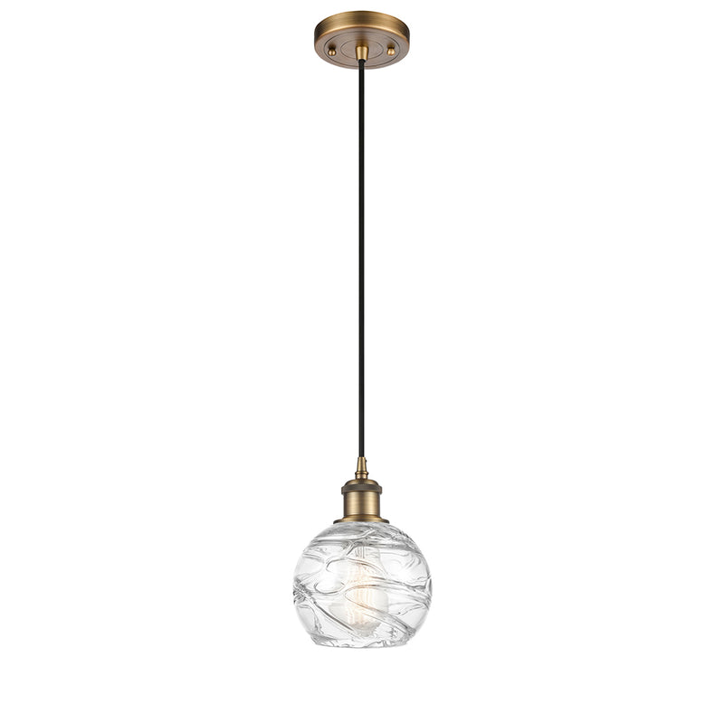 Deco Swirl Mini Pendant shown in the Brushed Brass finish with a Clear shade