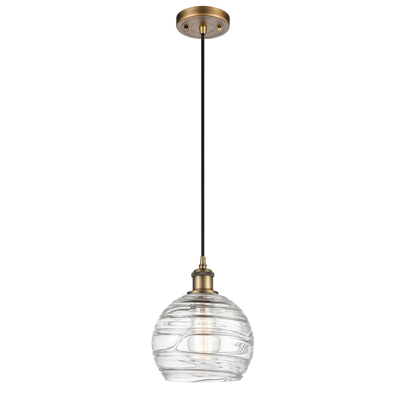 Deco Swirl Mini Pendant shown in the Brushed Brass finish with a Clear shade